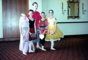 Rachel (left) after a community performance.